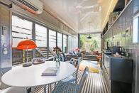 <p>This Airbnb vacation home in Wellington, New Zealand, was built from three stacked shipping containers. The rental has its own screening room and hydrotherapy spa.</p>