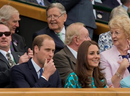 Jul 6, 2014; London, United Kingdom; Prince William the Duke of Cambridge and Kate Middleton the Duchess of Cambridge in attendance for the match between Novak Djokovic (SRB) and Roger Federer (SUI) on day 13 of the 2014 Wimbledon Championships at the All England Lawn and Tennis Club. Mandatory Credit: Susan Mullane-USA TODAY Sports