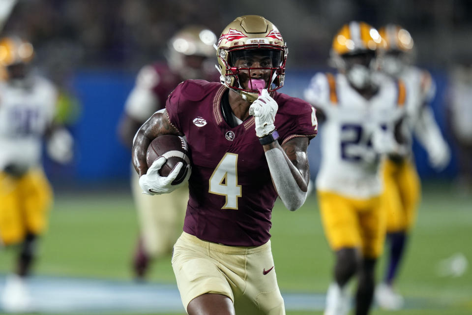 Keon Coleman and the Noles look to stay ahead of the pack. (AP Photo/John Raoux)