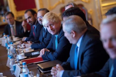 British Foreign Secretary Boris Johnson (C) takes part in a meeting on the situation in Syria at Lancaster House in London October 16, 2016. REUTERS/JUSTIN TALLIS/Pool