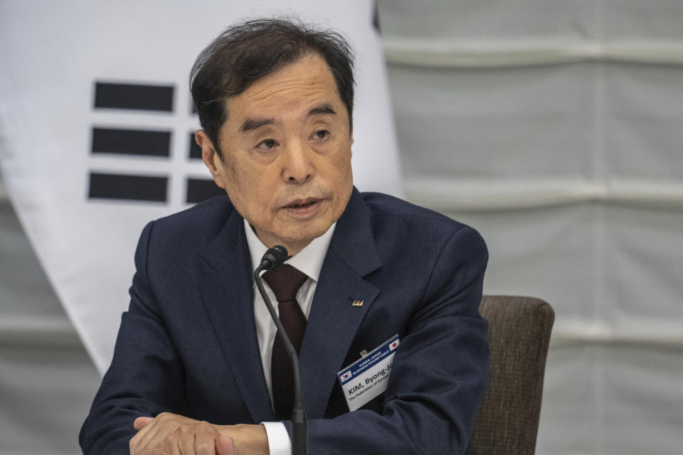 Kim Byong-joon, acting chairman of Federation of Korean Industries, attends a Japan-Korea business roundtable meeting with the Japan Business Federation, or Keidanren, in Tokyo, Friday, March 17, 2023. (Philip Fong/Pool Photo via AP)
