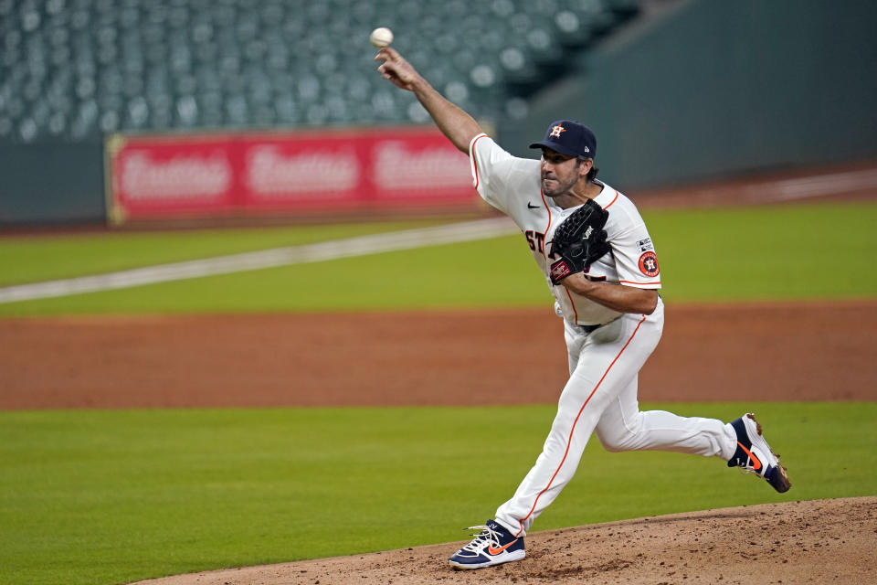 Houston Astros starting pitcher Justin Verlander throws against the Seattle Mariners during the third inning of a baseball game Friday, July 24, 2020, in Houston. (AP Photo/David J. Phillip)