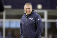 FILE - In this Oct. 27, 2019, file photo, New England Patriots head coach Bill Belichick watches his team warm up before an NFL football game against the Cleveland Browns, in Foxborough, Mass. With no defensive coordinator and coach Bill Belichick calling the plays, a veteran group of "Boogeymen" linebackers and stingy secondary lead a unit that is allowing a league-low 11 points per game have forced a NFL-best 27 turnovers. (AP Photo/Elise Amendola, File)