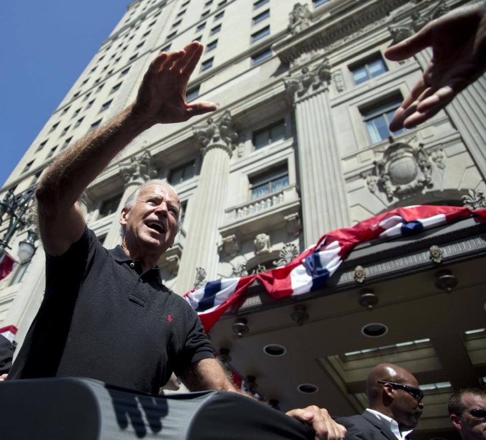 Vice President Joe Biden greets people after speaking at the Metro Detroit AFL-CIO Labor Day Rally, Monday, Sept. 3, 2012, in Detroit. (AP Photo/Carolyn Kaster)