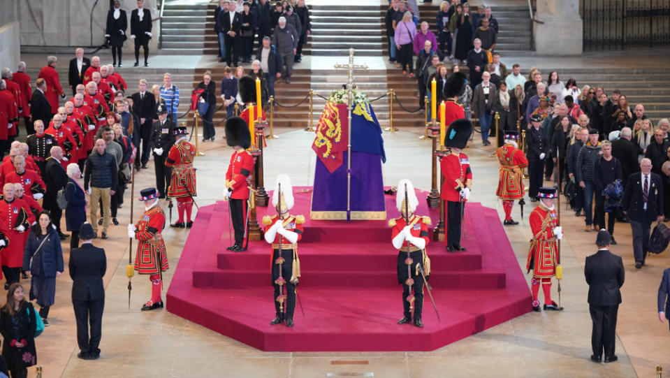 Visitors file past Queen Elizabeth II’s coffin in Westminster.