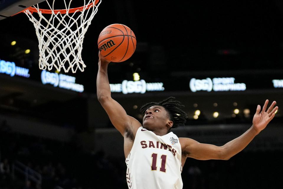 Lutheran Saint LJ Ward (11) goes to the basket for a dunk during IHSAA Class A state finals Saturday, March 25, 2023, at Gainbridge Fieldhouse in Indianapolis.