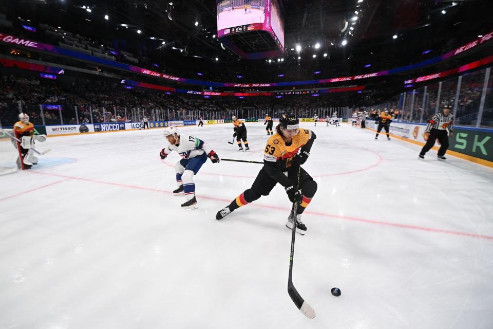 Germany defenseman Moritz Seider controls the puck during the World Championships semifinal match in Tampere, Finland, on Saturday, May 27, 2023.