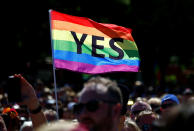 <p>Supporters of the ‘Yes’ vote for marriage equality celebrate after it was announced the majority of Australians support same-sex marriage in a national survey, paving the way for legislation to make the country the 26th nation to formalize the unions by the end of the year, at a rally in central Sydney, Australia, Nov. 15, 2017. (Photo: David Gray/Reuters) </p>