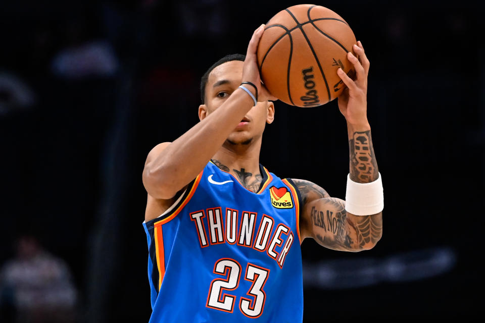 CHARLOTTE, NORTH CAROLINA – OCTOBER 15: Tre Mann #23 of the Oklahoma City Thunder looks to pass the ball during the second half of the game against the Charlotte Hornets at Spectrum Center on October 15, 2023 in Charlotte, North Carolina. (Photo by Matt Kelley/Getty Images)