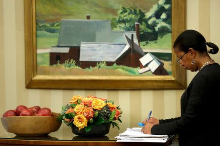 U.S. National Security Advisor Susan Rice makes notes as President Barack Obama and Indonesia's President Joko Widodo (neither pictured) speak to reporters after their meeting in the Oval Office at the White House in Washington, October 26, 2015. REUTERS/Jonathan Ernst