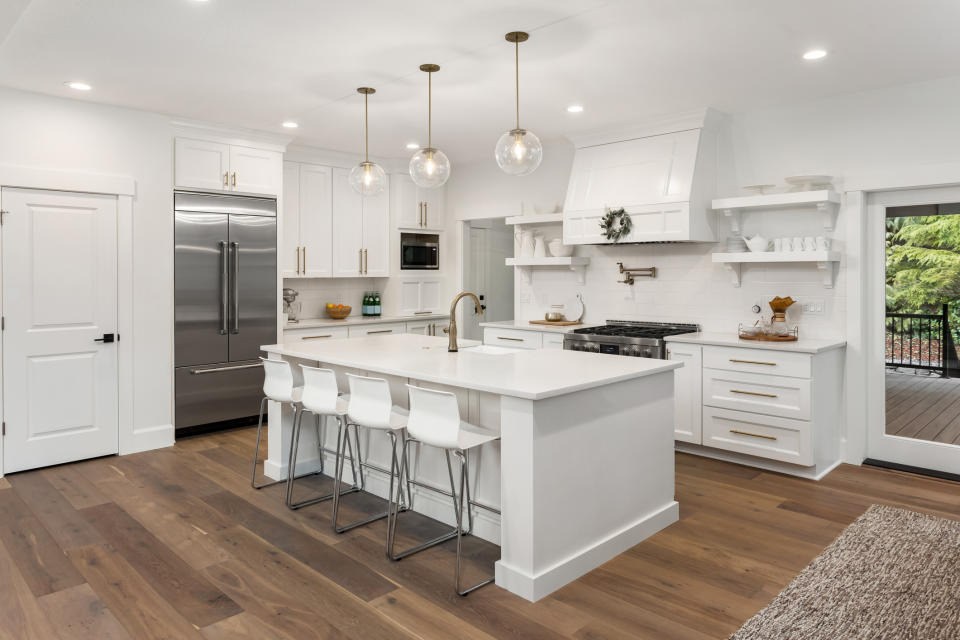 Large white kitchen with center island