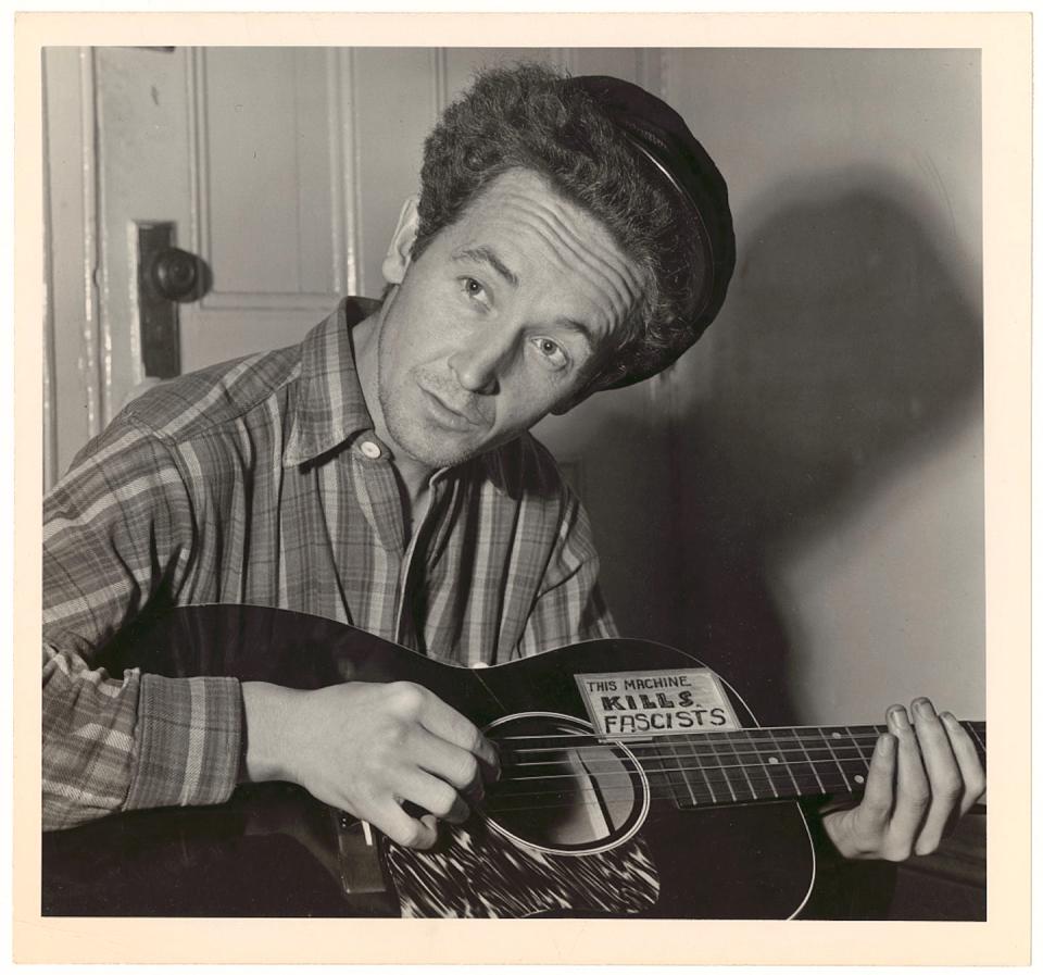 Guthrie, who was known as ‘the Dust Bowl troubador’ for his songs about the Dust Bowl and the Depression. <a href="https://www.loc.gov/resource/ppmsca.74705/" rel="nofollow noopener" target="_blank" data-ylk="slk:Library of Congress, World Telegram photo by Al Aumuller;elm:context_link;itc:0;sec:content-canvas" class="link ">Library of Congress, World Telegram photo by Al Aumuller</a>