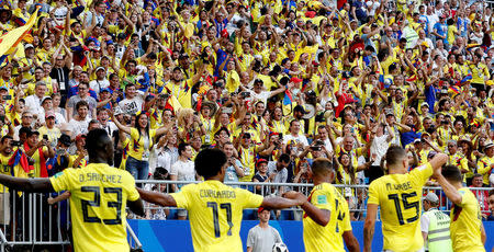 Soccer Football - World Cup - Group H - Senegal vs Colombia - Samara Arena, Samara, Russia - June 28, 2018 Colombia players celebrate in front of fans after Yerry Mina scores their first goal REUTERS/Carlos Garcia Rawlins