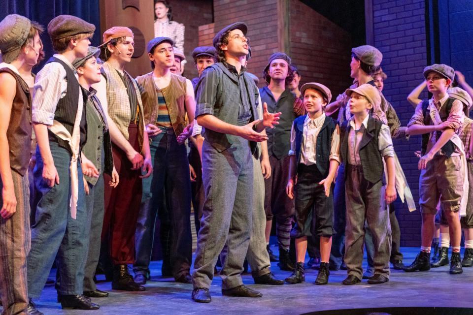 Jack, center, played by Brian Hirsch, rallies the newsboys in the musical "Newsies" at Weathervane Playhouse.