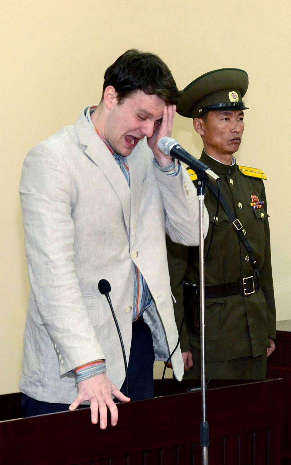 Released from North Korea's official Korean Central News Agency (KCNA) on March 16, 2016, this picture shows the trial of US student Otto Warmbier - Credit: KCNA/AFP