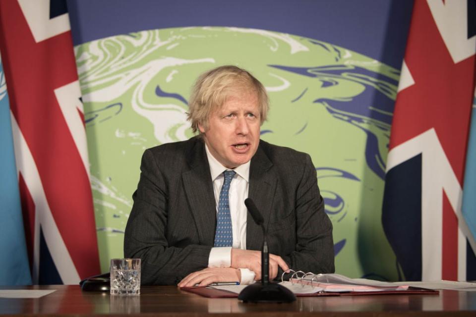  Prime Minister Boris Johnson chairs a session of the UN Security Council on climate and security at the Foreign, Commonwealth and Development Office on 23 February, 2021 (Getty)