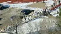 Students from Arapahoe High School evacuate their building in Centennial, Colorado December 13, 2013 in this still image from video Courtesy KUSA, Channel 9 during a shooting incident in which at least two students were injured. Police reported the gunman took his own life. REUTERS/Courtesy KUSA, Channel 9