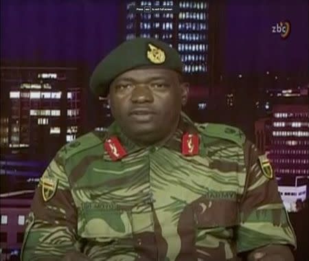 Zimbabwe Defence Forces Major-General SB Moyo makes an announcement on state broadcaster ZBC, in this still image taken from a November 15, 2017 video. ZBC/Handout via REUTERS