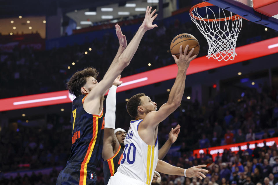 Nov 3, 2023; Oklahoma City, Oklahoma, USA; Golden State Warriors guard Stephen Curry (30) shoots in front of Oklahoma City Thunder forward Chet Holmgren (7) during the second half at Paycom Center. Mandatory Credit: Alonzo Adams-USA TODAY Sports