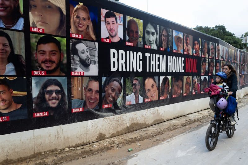 The IDF said Friday that in a tragic accident three Gaza hostages were killed by IDF troops who mistakenly thought they were a threat. A billboard in Tel Aviv, Israel on Wednesday shows the 137 hostages held hostage by Hamas and other militant groups in Gaza. Photo by Jim Hollander/UPI
