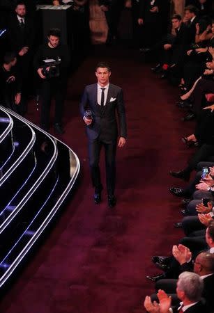 Soccer Football - The Best FIFA Football Awards - London Palladium, London, Britain - October 23, 2017 Real Madrid’s Cristiano Ronaldo after being selected in the FIFA FIFPro World 11 during the awards REUTERS/Eddie Keogh