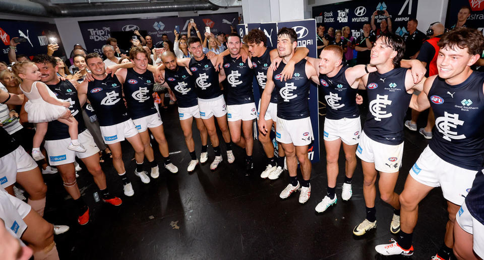 Seen here, Carlton players celebrate their Opening Round win over Brisbane at the Gabba. 