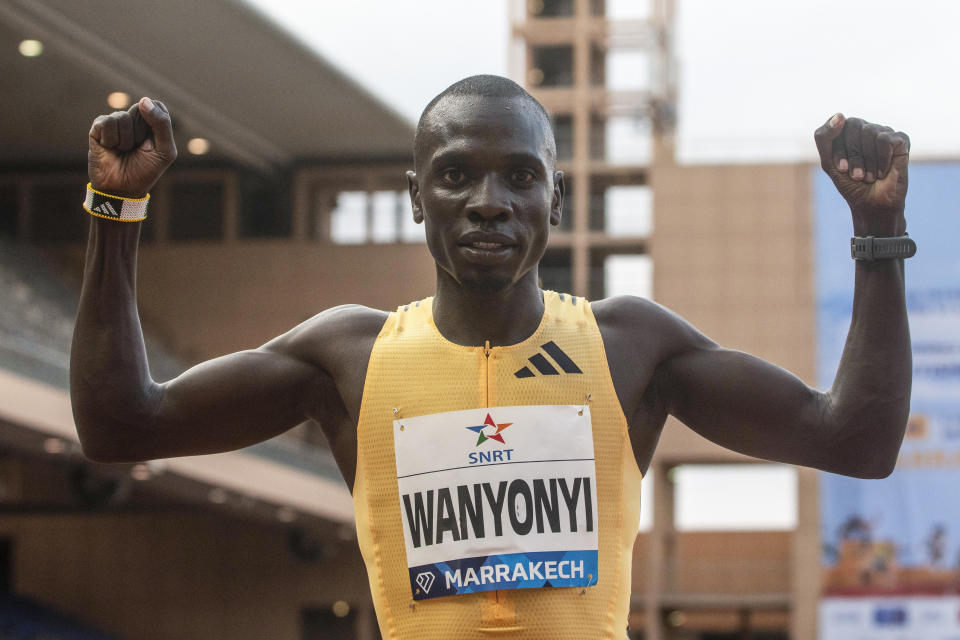 Kenya's Emmanuel Wanyonyi celebrates after winning the men's 800-meter race at the Diamond League athletics meet in Marrakech, Morocco, Sunday, May 19, 2024. (AP Photo/Mosa'ab Elshamy)