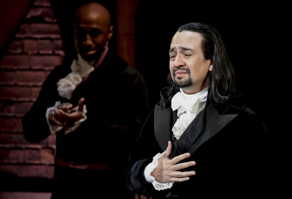 Lin-Manuel Miranda, composer and creator of the award-winning Broadway musical, Hamilton, receives a standing ovation with tears at the ending of the play's premiere held at the Santurce Fine Arts Center, in San Juan, Puerto Rico, Friday, Jan. 11, 2019. The musical is set to run for two weeks and will raise money for local arts programs. (AP Photo/Carlos Giusti)