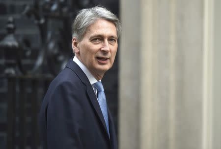 Britain's Chancellor of the Exchequer Philip Hammond arrives in Downing Street, London March 29, 2017. REUTERS/Hannah McKay