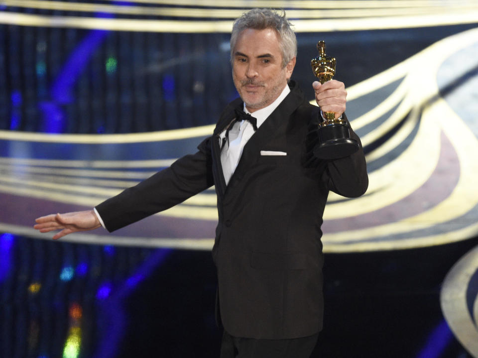 Alfonso Cuaron accepts the award for best cinematography for "Roma" at the Oscars on Sunday, Feb. 24, 2019, at the Dolby Theatre in Los Angeles. (Photo by Chris Pizzello/Invision/AP)