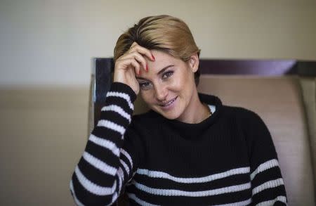 Actress Shailene Woodley poses for a portrait while promoting the upcoming movie "White Bird in a Blizzard" in Los Angeles, California October 20, 2014. REUTERS/Mario Anzuoni