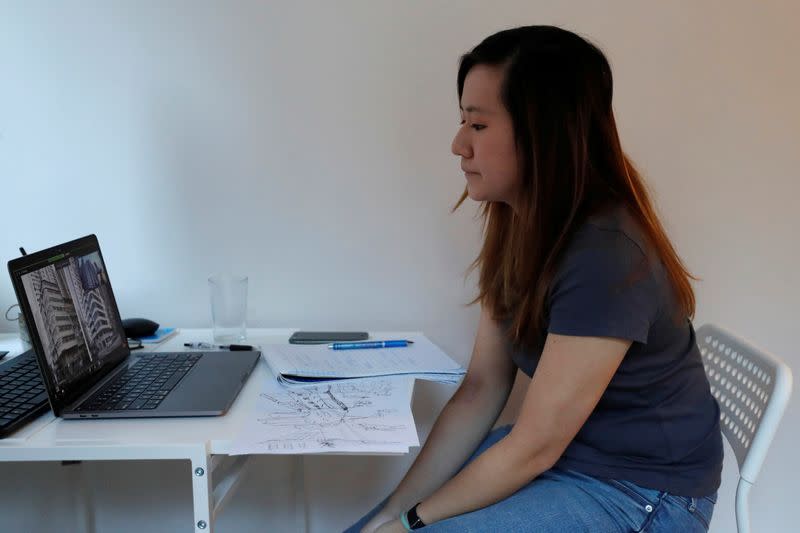Julianne Chan, 27, joins a virtual tour about architecture in Kennedy Town, following the coronavirus disease (COVID-19) outbreak in Hong Kong