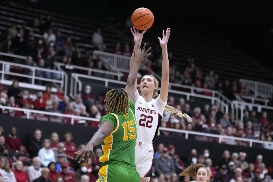 Stanford forward Cameron Brink (22) takes a shot over Oregon center Phillipina Kyei (15) during the first half of an NCAA college basketball game Friday, Jan. 19, 2024, in Stanford, Calif. (AP Photo/Tony Avelar)