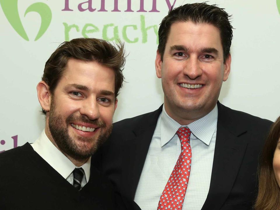 <p>Cindy Ord/Getty</p> John Krasinski and Paul Krasinski  attend Family Reach