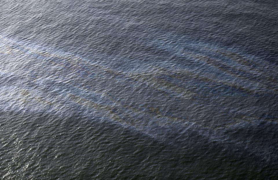 A March 31, 2015, photo shows an oil sheen drifting from the site of the former Taylor Energy oil rig in the Gulf of Mexico, off the coast of Louisiana.