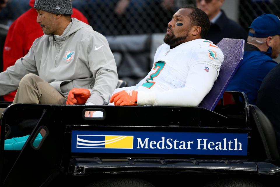 Dolphins linebacker Bradley Chubb is carted off after injuring his knee against the Ravens.