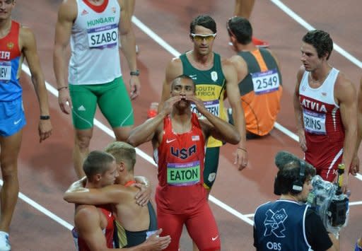 Ashton Eaton celebrates his decathlon gold medal after the final event the 1500m. Usain Bolt admitted Thursday that despite streaking to a unique second successive Olympic sprint double, decathlon champion Ashton Eaton was the best athlete in the world