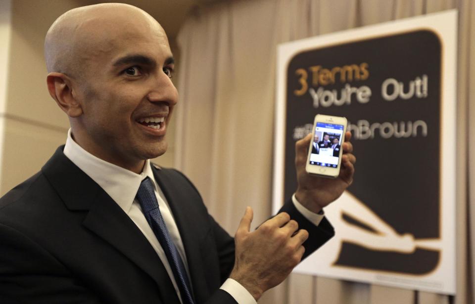 Gubernatorial candidate Neel Kashkari displays a campaign video posted to Instagram at the California Republican Party 2014 Spring Convention Saturday, March 14, 2014, in Burlingame, Calif. (AP Photo/Ben Margot)