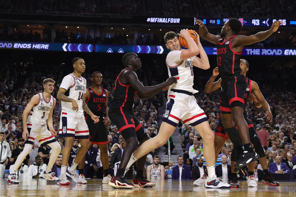 A March Madness repeat: Donovan Clingan and UConn meet San Diego State on Thursday in a rematch of the 2023 national title game. (Photo by Carmen Mandato/Getty Images)