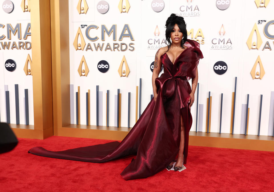 K. Michelle in burgundy gown