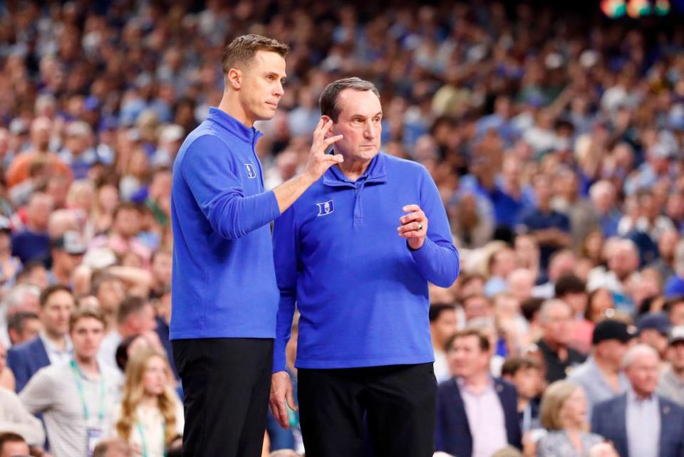 Duke head coach Mike Krzyzewski and associate head coach Jon Scheyer talk during the second half of UNC’s 81-77 victory over Duke in the Final Four at Caesars Superdome in New Orleans, La., Saturday, April 2, 2022. Ethan Hyman/ehyman@newsobserver.com