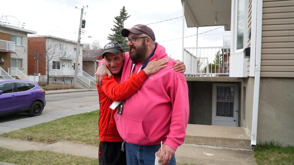 Conrad Tremblay, left, recently accessed housing in Montreal thanks to help from Old Brewery Mission outreach worker Nicholas Singcaster, right.                             (Verity Stevenson/CBC - image credit)