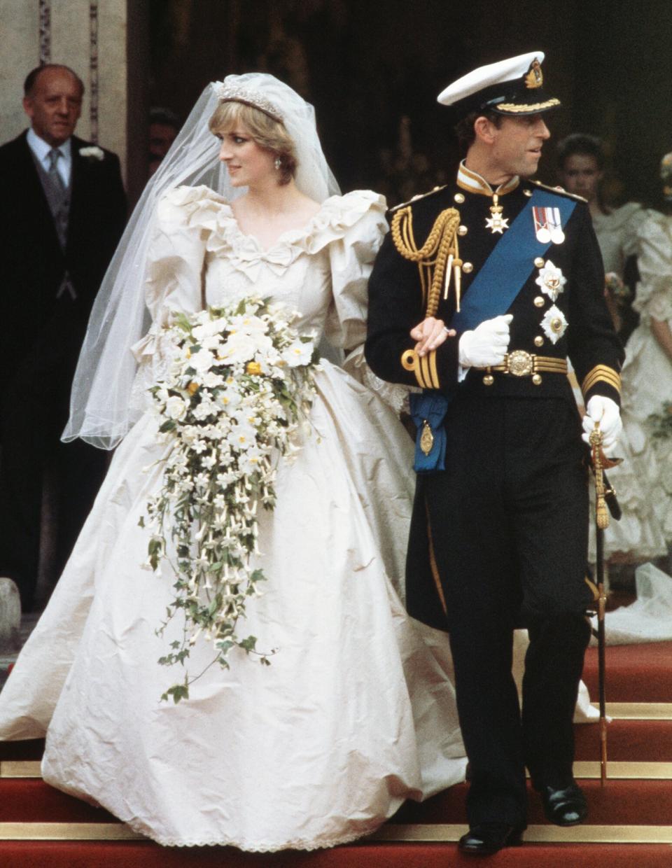 The wedding of Prince Charles and Lady Diana Spencer at St Paul's Cathedral in London, 29th July 1981. The couple leave the cathedral after the ceremony