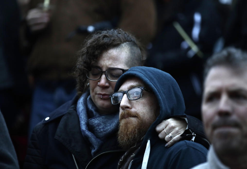 People gather for a vigil in the aftermath of a deadly shooting at the Tree of Life Congregation in Pittsburgh, Saturday, Oct. 27, 2018. (AP Photo/Matt Rourke)