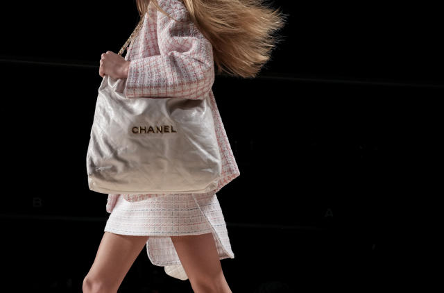 Chanel shows mismatched hems and flip-flops at Paris Fashion Week