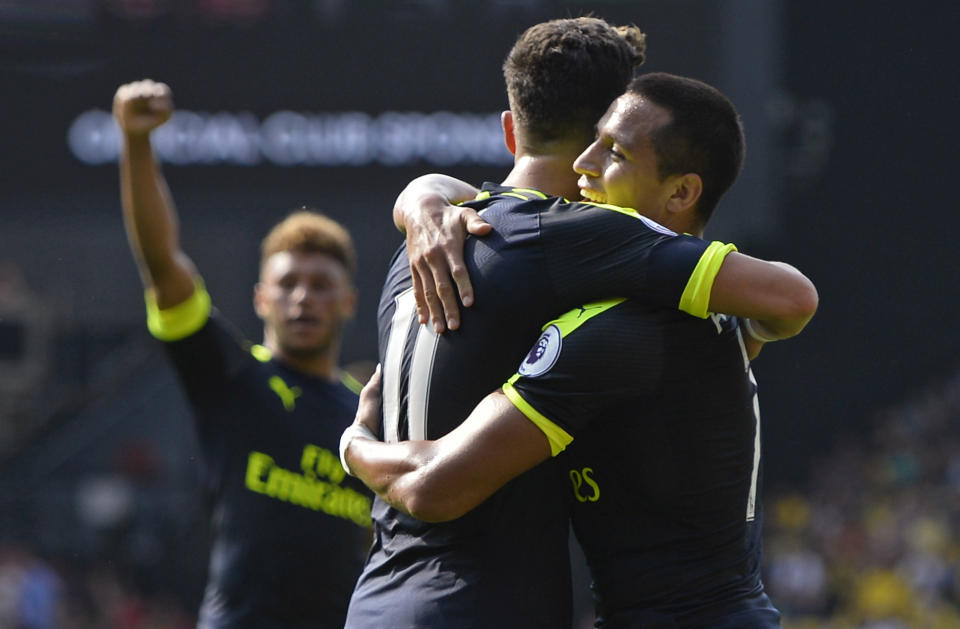 Football Soccer Britain - Watford v Arsenal - Premier League - Vicarage Road - 27/8/16 Arsenal's Mesut Ozil celebrates scoring their third goal with Alexis Sanchez Reuters / Hannah McKay Livepic EDITORIAL USE ONLY. No use with unauthorized audio, video, data, fixture lists, club/league logos or "live" services. Online in-match use limited to 45 images, no video emulation. No use in betting, games or single club/league/player publications. Please contact your account representative for further details.