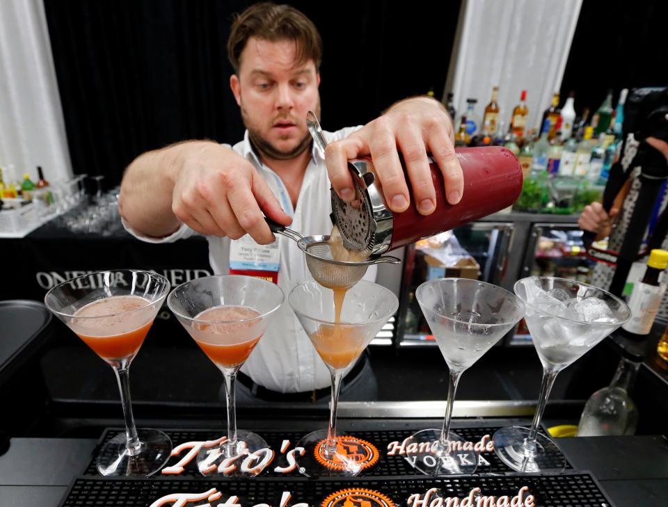 Tony Collins pours his entry during the Cocktail Shakedown at the Oklahoma Restaurant Association Convention and Expo in this 2015 file photo.