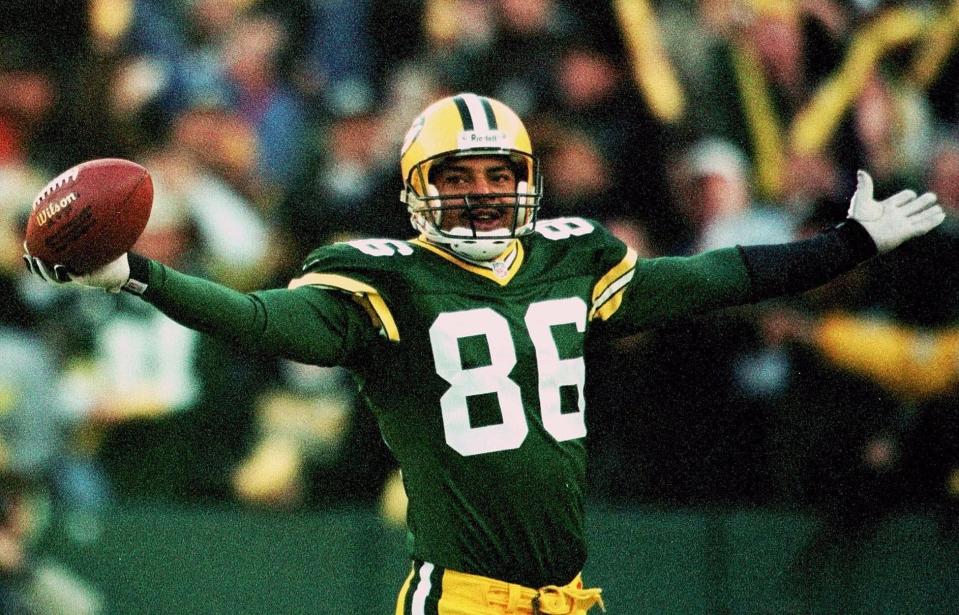 Green Bay Packers wide receiver Antonio Freeman reacts after catching an 80-yard touchdown pass from quarterback Brett Favre on the first play of the game against the San Francisco 49ers Sunday, Nov. 1, 1998, in Green Bay, Wis.