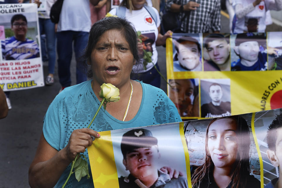 Mothers with disappeared children march to demand government help in the search for their missing loved ones on Mother's Day in Mexico City, Wednesday, May 10, 2023. (AP Photo/Marco Ugarte)