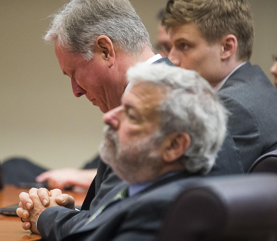 Former DeKalb County police officer Robert Olsen becomes emotional during his sentencing, Friday, Nov. 1, 2019, in Decatur, Ga. Olsen, who was convicted of aggravated assault and other crimes in the fatal shooting of an unarmed, naked man, was sentenced Friday to 12 years in prison.. (Alyssa Pointer/Atlanta Journal-Constitution via AP)